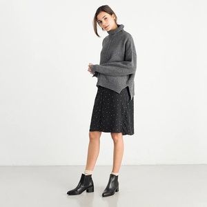 Black polka dot button dress